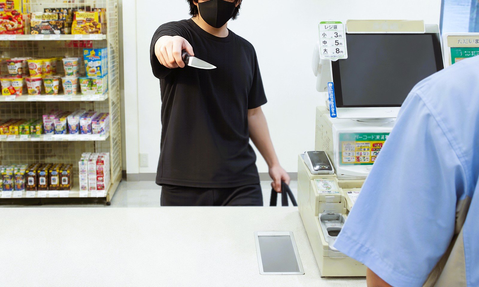 コンビニで男が店員に包丁のようなものを突きつけたイメージ画像